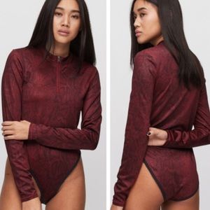 NWT Nike bodysuit size red python pattern